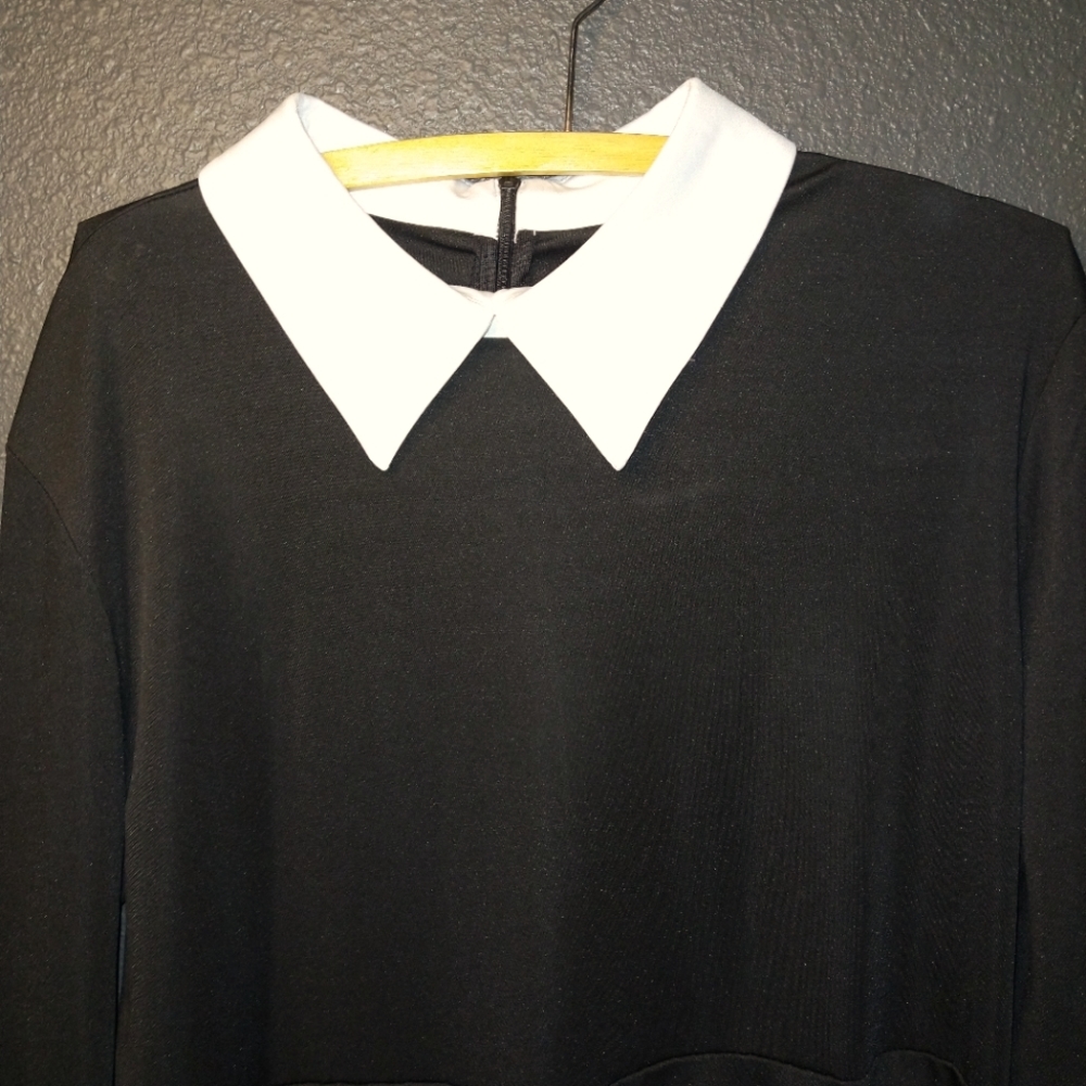 A black long sleeve dress